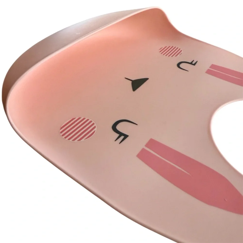 Three Silicone Baby Plates and one Pink Bib